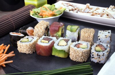 Tableau  sushi rolls prepared on plate / platter with sushi menu
