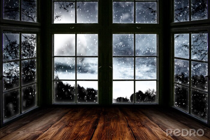 Tableau  Table top board with big window background and beautiful snowy winter landscape outside. Moonlight winter night.