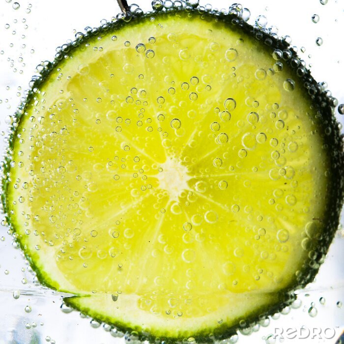 Tableau  Tranche de citron vert juteux dans l'eau