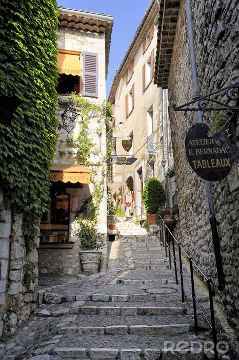 Tableau  Une rue étroite dans une ville