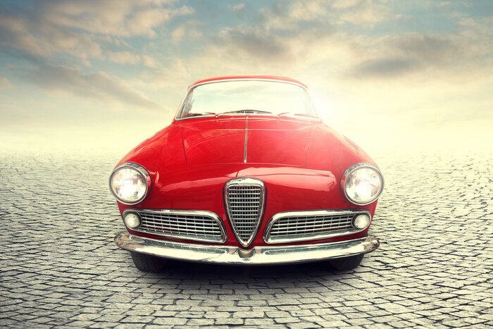 Tableau  Vieille voiture de ville rouge presque dans la rue