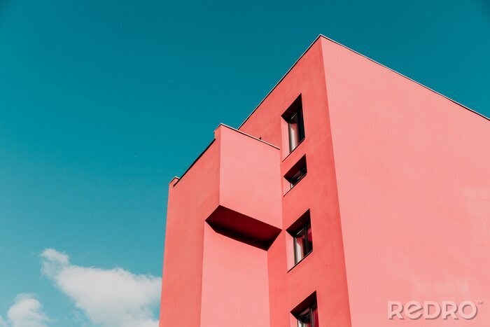 Tableau  View from below on a pink modern house and sky. Vintage pastel colors, minimalist concept.