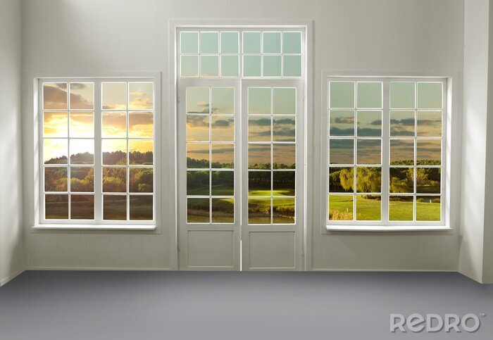 Tableau  Vue d'une prairie au coucher du soleil à travers des fenêtres blanches