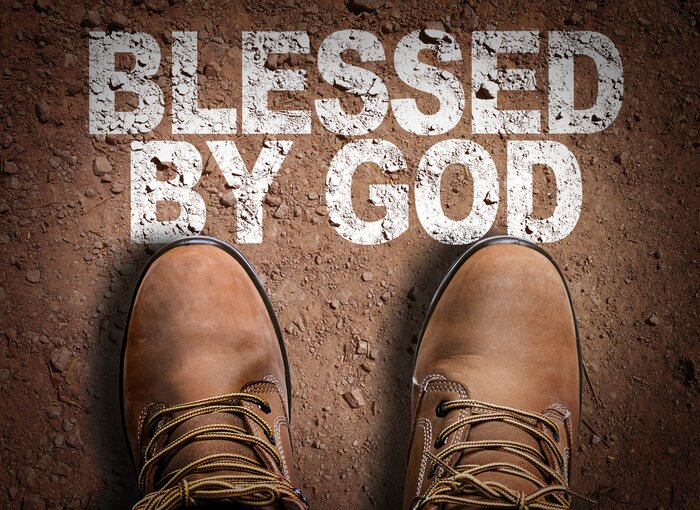 Tableau  Vue de dessus de botte sur la piste avec le texte: Béni par Dieu