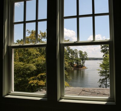 Tableau  Window with view of a lake in the distance