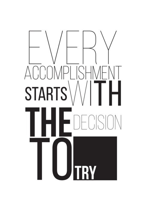 Tableau  Citation de J.F. Kennedy : « Chaque performance commence par la décision d'essayer. »