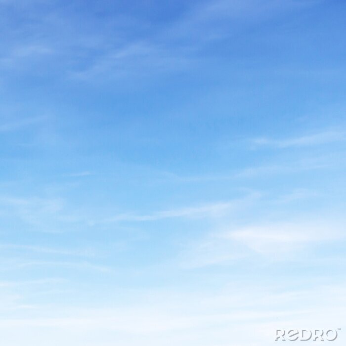 Tableau  Nuages ​​blancs doux fantastiques contre le ciel bleu.
