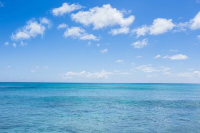 Tableau  paysage marin avec des nuages ​​et fond de ciel bleu