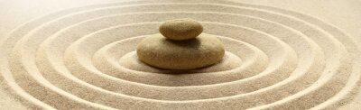 Tableau  zen garden meditation stone background with stones and lines in sand for relaxation balance and harmony spirituality or spa wellness